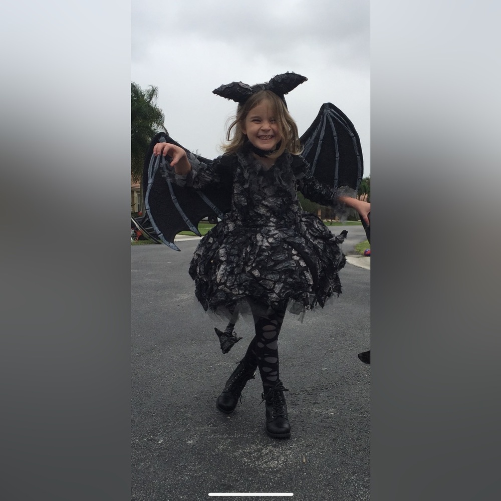 Chasing Fireflies.  Dragon/witch/she devil dress with tail.
